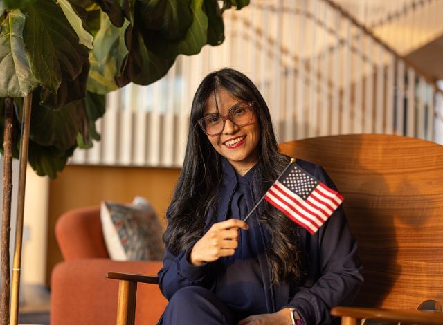 Coraima-flag-pic-w-glasses.jpg